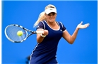 BIRMINGHAM, ENGLAND - JUNE 10: Aleksandra Wozniak of Canada in action during her first round match against Heather Watson of Great Britain on day two of the Aegon Classic at Edgbaston Priory Club on June 10, 2014 in Birmingham, England.  (Photo by Tom Dulat/Getty Images)